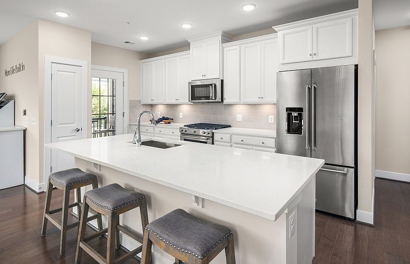 Model Representation - Bright and Open Kitchen Featuring Quartz Countertops and Stainless Steel Appl