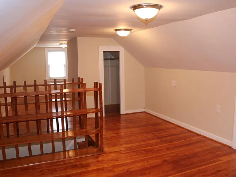 Upstairs loft with built in bookshelves