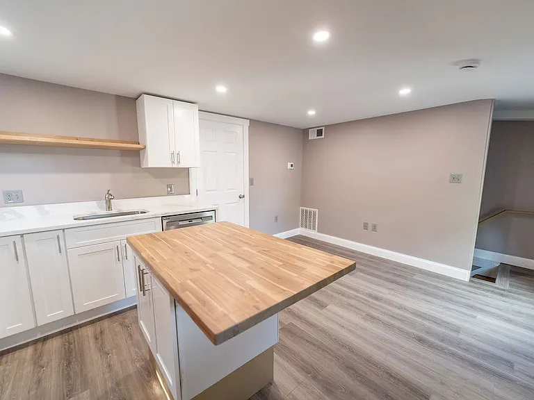 Beautiful newly restored kitchen/shared room, modern appliances and butcher block island!