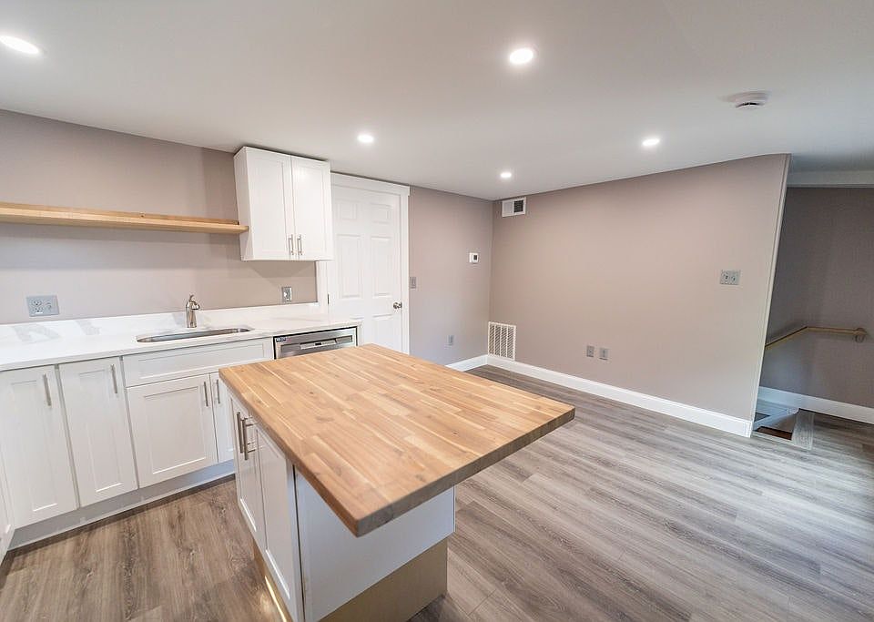 Beautiful newly restored kitchen/shared room, modern appliances and butcher block island!