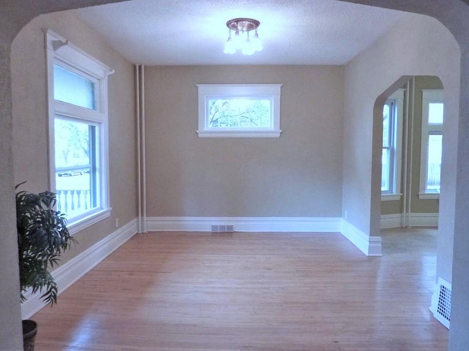 Spacious Living Room and a view of the attractive freshly refinished Hardwood Floors