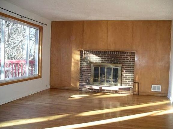 Upstairs living area overlooking backyard and deck