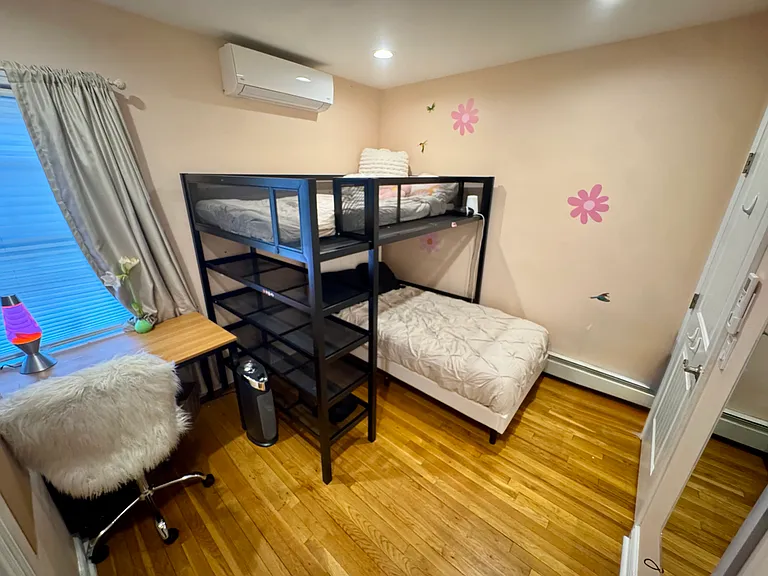 second bedroom with a full and a twin and a desk