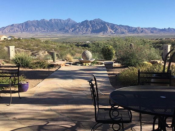 View from HUGE back Patio with Fireplace and Outdoor Kitchen