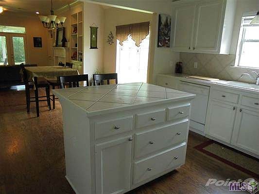 Kitchen with Island Opens to Dining Area