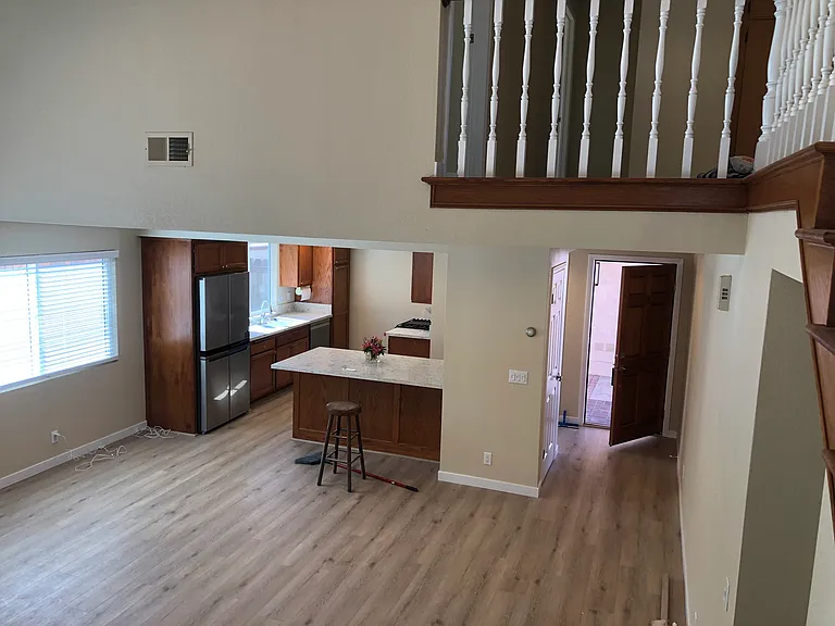 Front door, dining area, kitchen