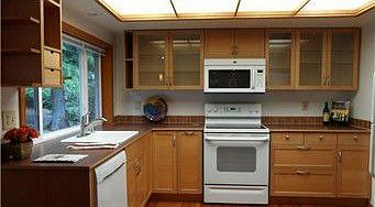 Updated and well organized kitchen with views of the serene backyard