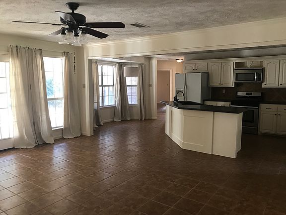 Open kitchen and den