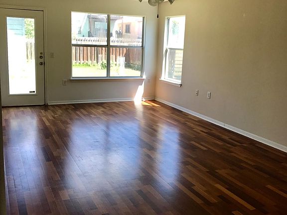 Living room with real hardwood flooring