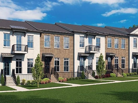 Welcome home to the Benton IV at Ward s Crossing in Johns Creek! Please note that the photos shown a