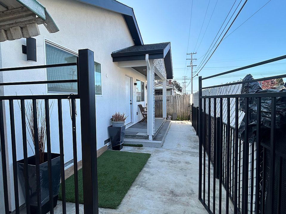 Front of house - showing connecting door but will not have access and remain locked.