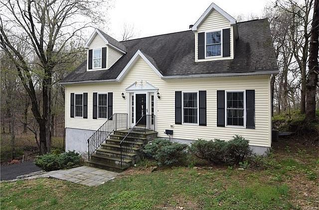Custom, expanded cape cod home.  Maintenance free exterior.