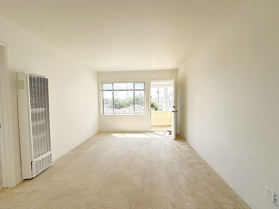 Lots of natural lighting throughout, new carpets and wall-mounted heater!