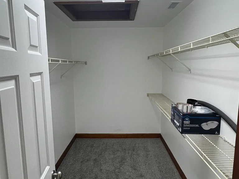 Master walk-in closet w/ attic access