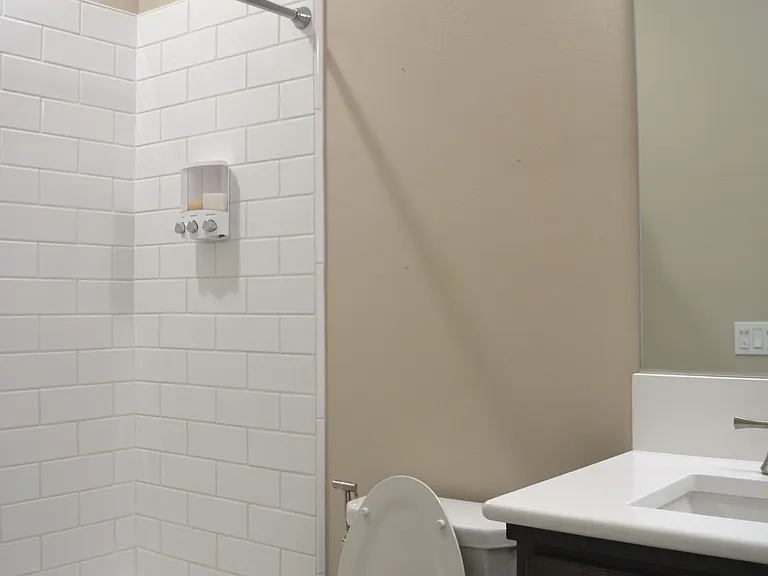 Bathroom 2 - the toilet and bathtub.