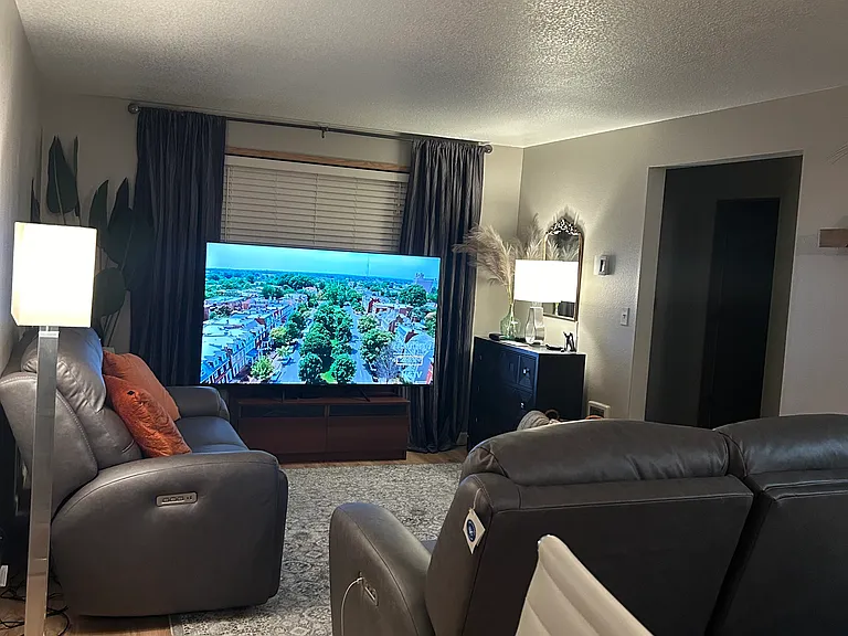 Another angle of the family room with a dining area.