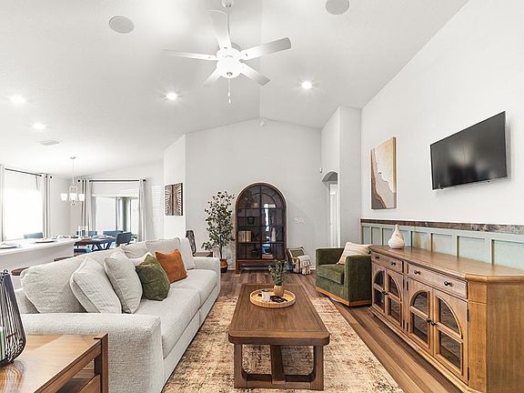 This popular 1,819 sq. ft. home plan includes a sunny open-concept layout - Raychel by Highland Home
