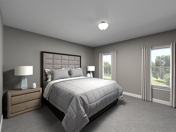 The luxurious primary suite is the perfect place to relax and unwind after a long day.