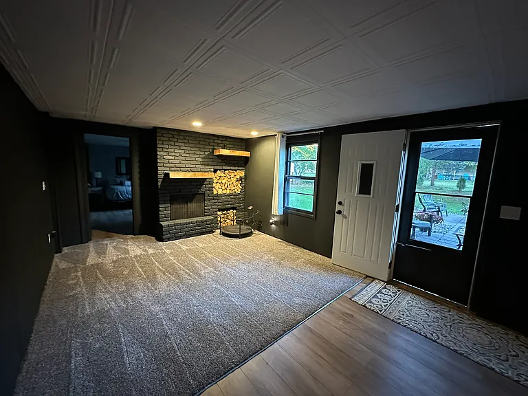 Downstairs living offers fireplace and walkout.