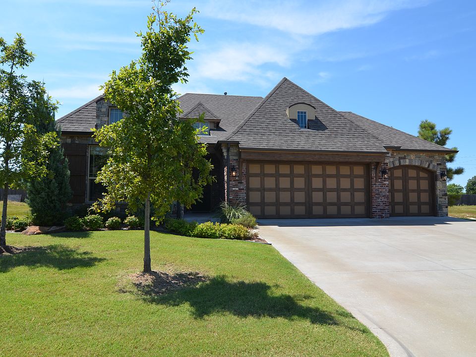Front view facing east, 3 car garage