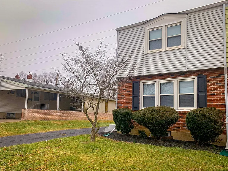 Front of house with driveway