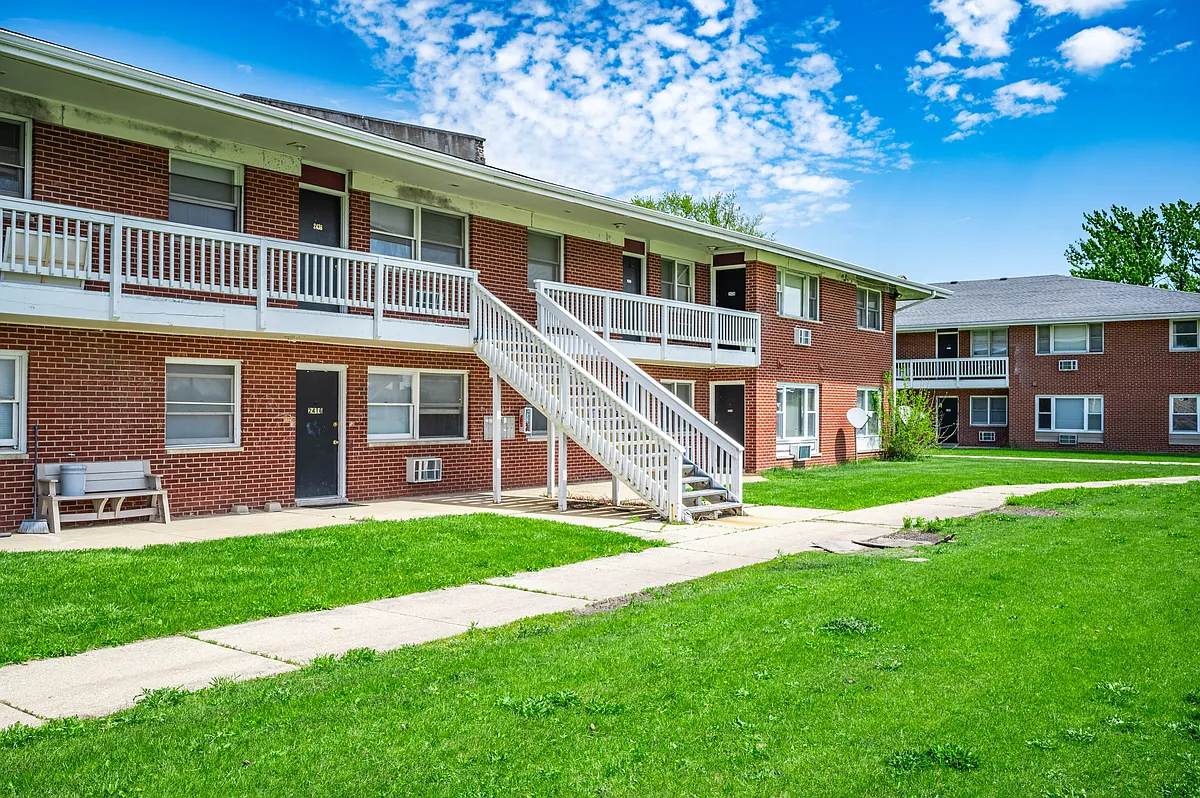 Building Photo - Suburban Apartments and Estates