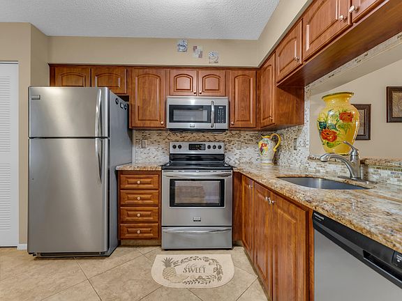 2nd image of 7340 AMBERLY Lane #210