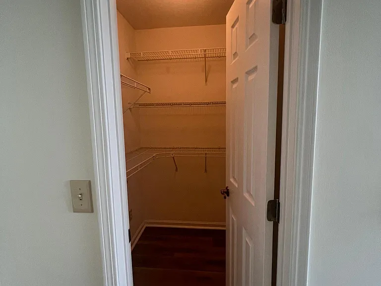 Primary bedroom walk-in closet #1