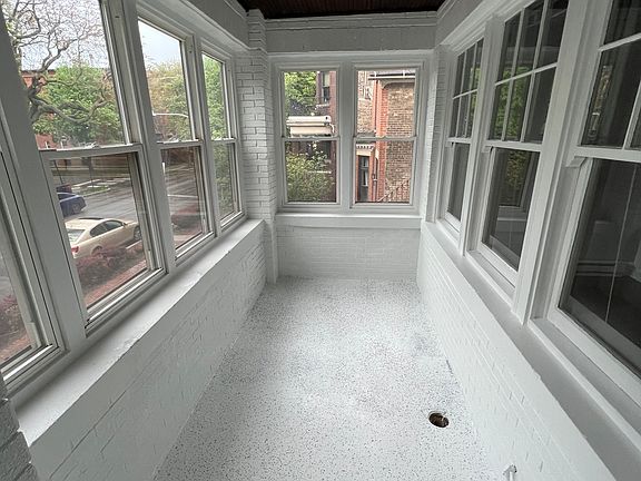 Enclosed front room off bedroom 1