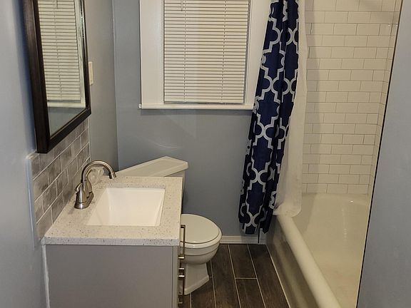 new vanity for bathroom, new tiles for the bathing area.