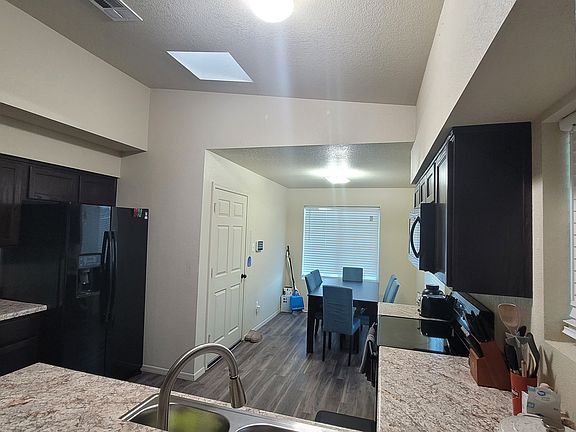 4th image of 7051 E 37th Pl