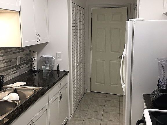 Kitchen with laundry at end