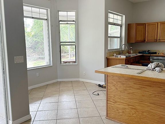 KITCHEN - CURRETNLY BEING PAINTED - HAS DINING AREA AND BREAKFAST NOOK