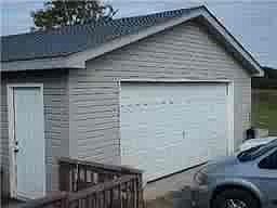 LARGE garage steps away from deck and pool