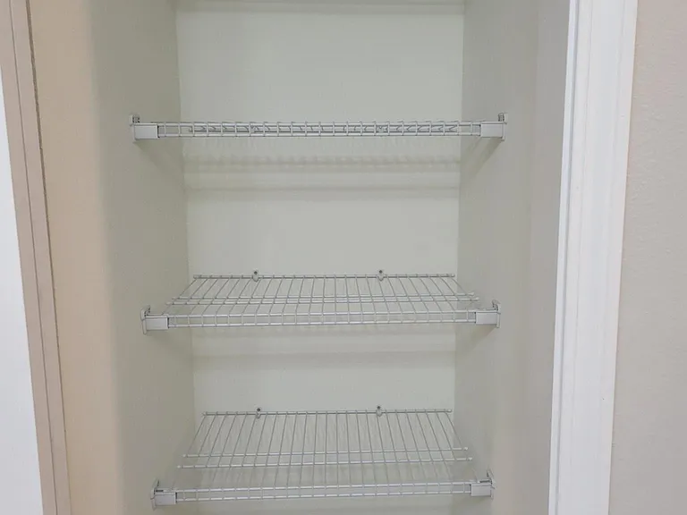 Linen closet in guest bathroom
