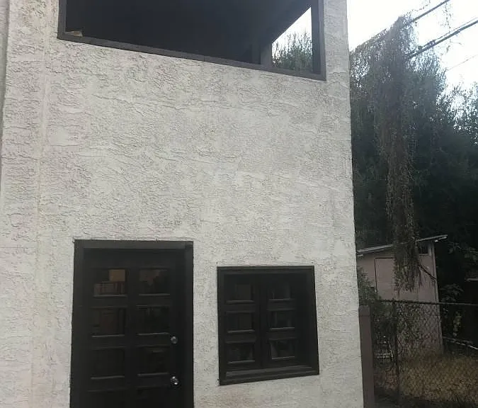 Apartment entrance and window.