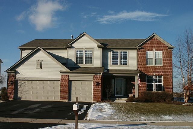 Brick Front with 3 car garage