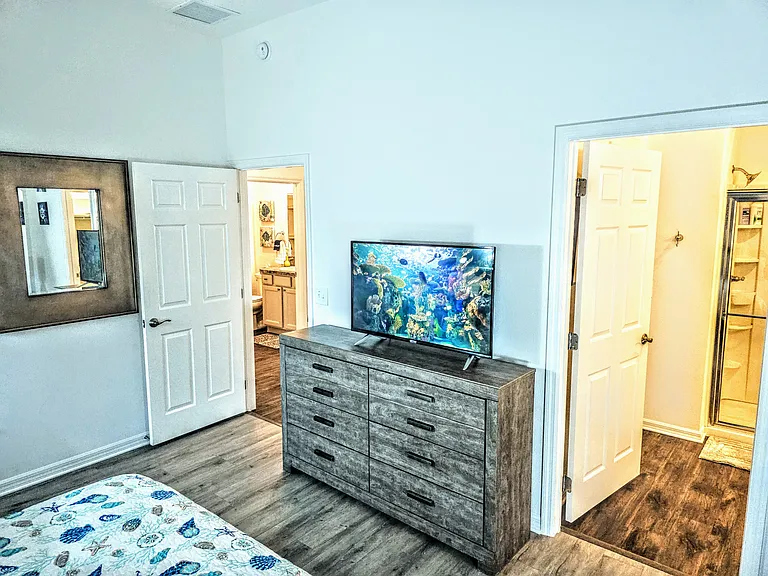 55' smart tv in the master bedroom