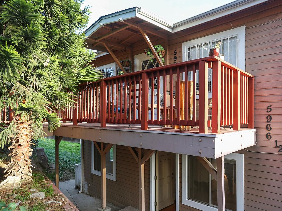 Building Front Exterior. Available unit is lower level.