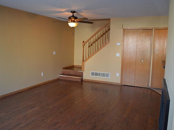 Main living room with ceiling fan