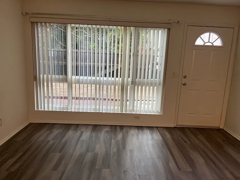 Closer Look at Living Room with Entry Door
