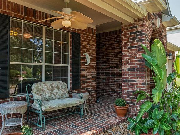 Covered front porch is perfect for relaxing