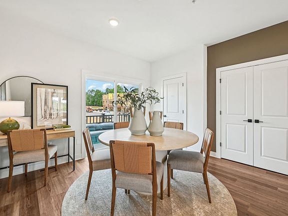 Cafe Space off the Kitchen with a Sliding Glass Door Leading to the Rear Deck