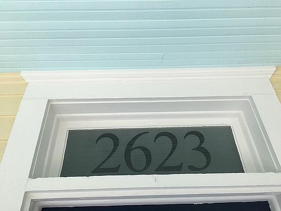 Lovely Custom Glass Transom over the front door.  Come in!