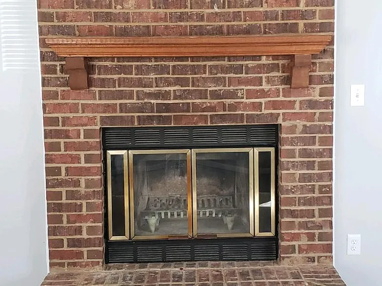 Wood burning fireplace in Family Room