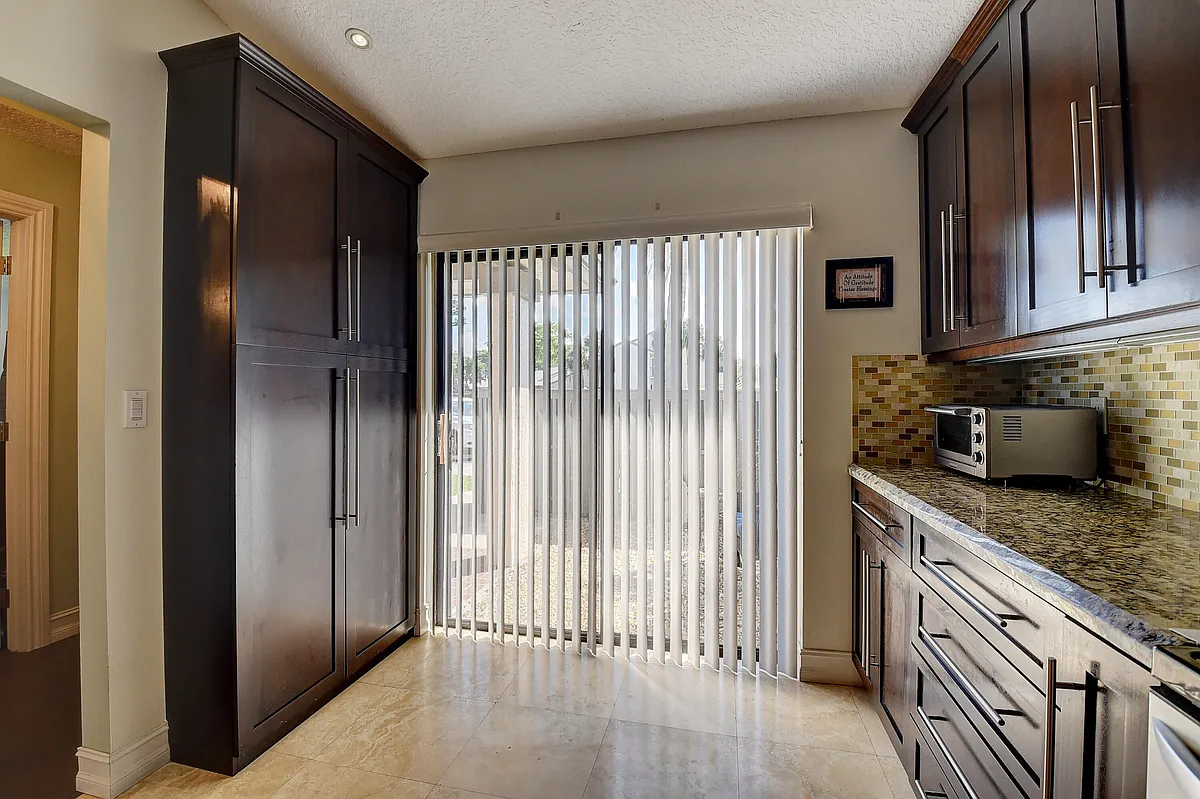 Building Photo - 8458 Boca Glades Blvd E