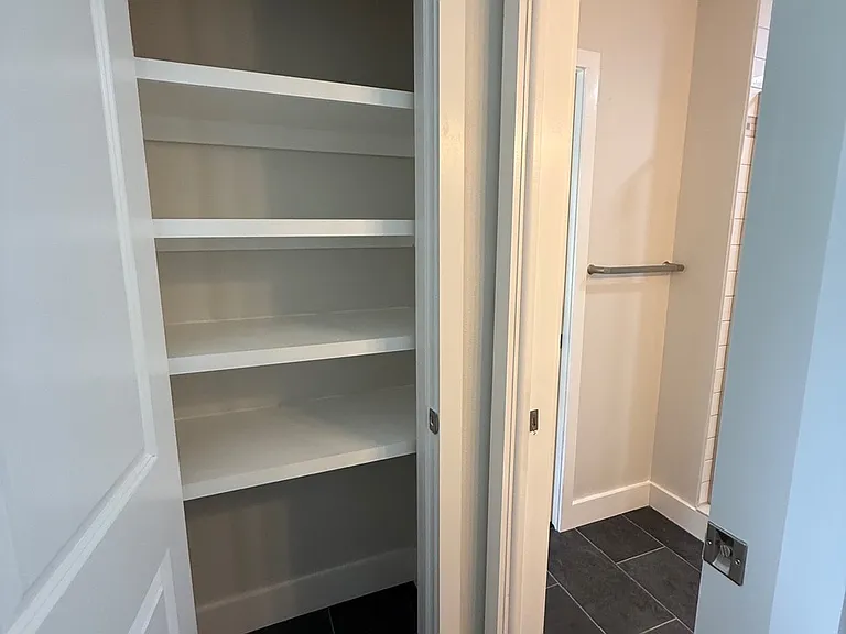Primary bathroom, storage closet