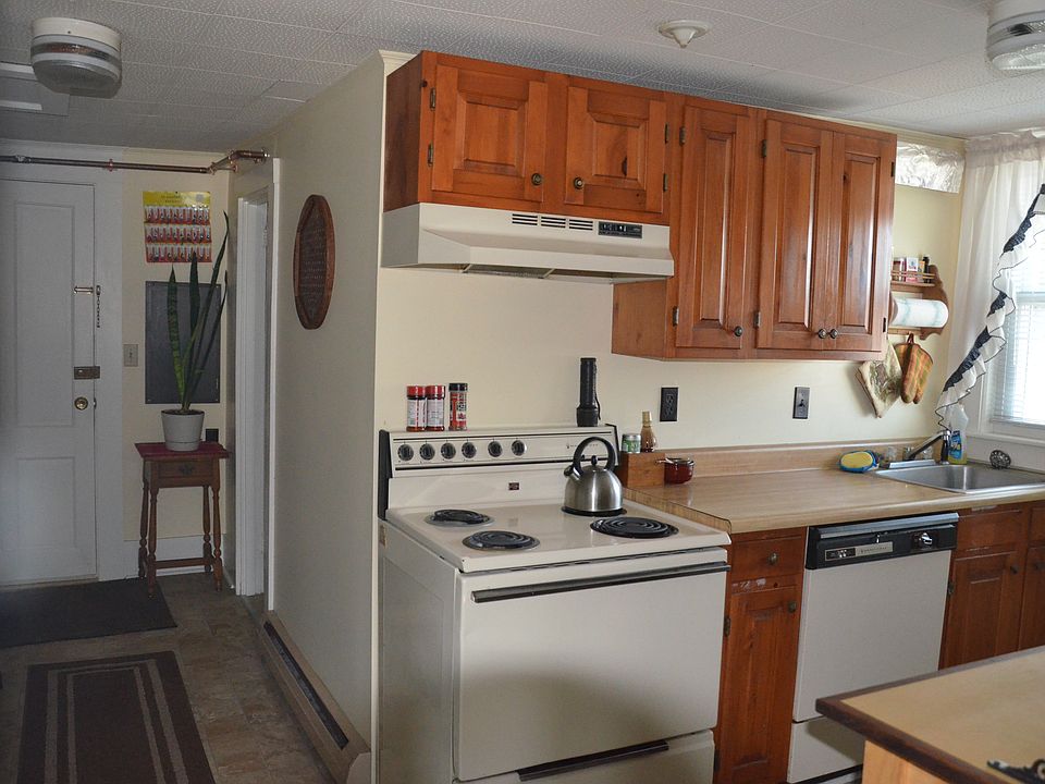All photos are before the renovation. New carpets; new paint with light gray walls; new appliances; new cabinets, sink, countertop