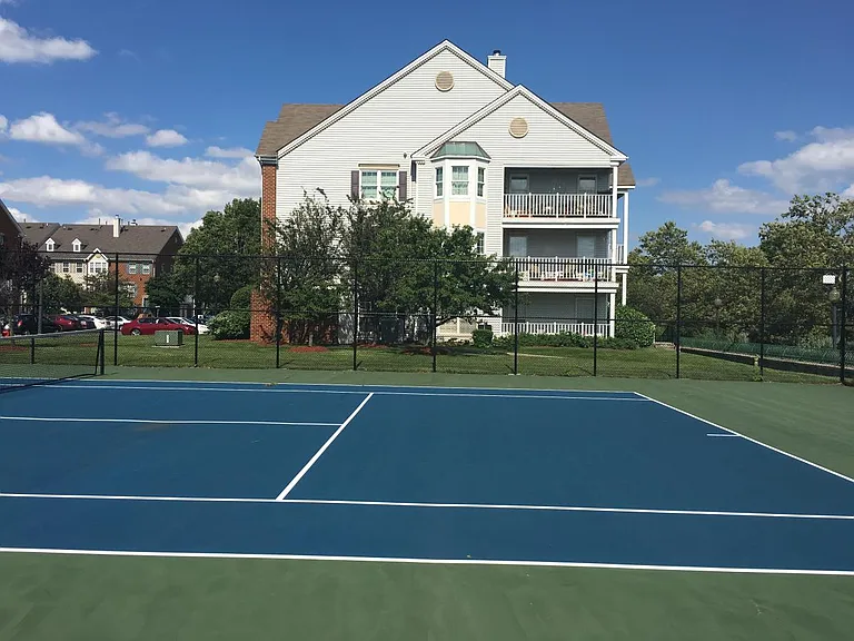 Building next to Tennis courts