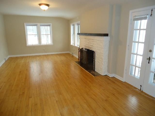 Large and beautiful living room looks out to front porch. High quality double pane windows throughout the entire home silence outside noise. If you are concerned about hearing the highway while enjoying movie night or dinner, fear not. You cannot hear it
